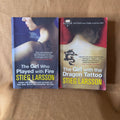 Millennium lot by Stieg Larsson: The Girl with the Dragon Tattoo and The Girl Who Played with Fire.