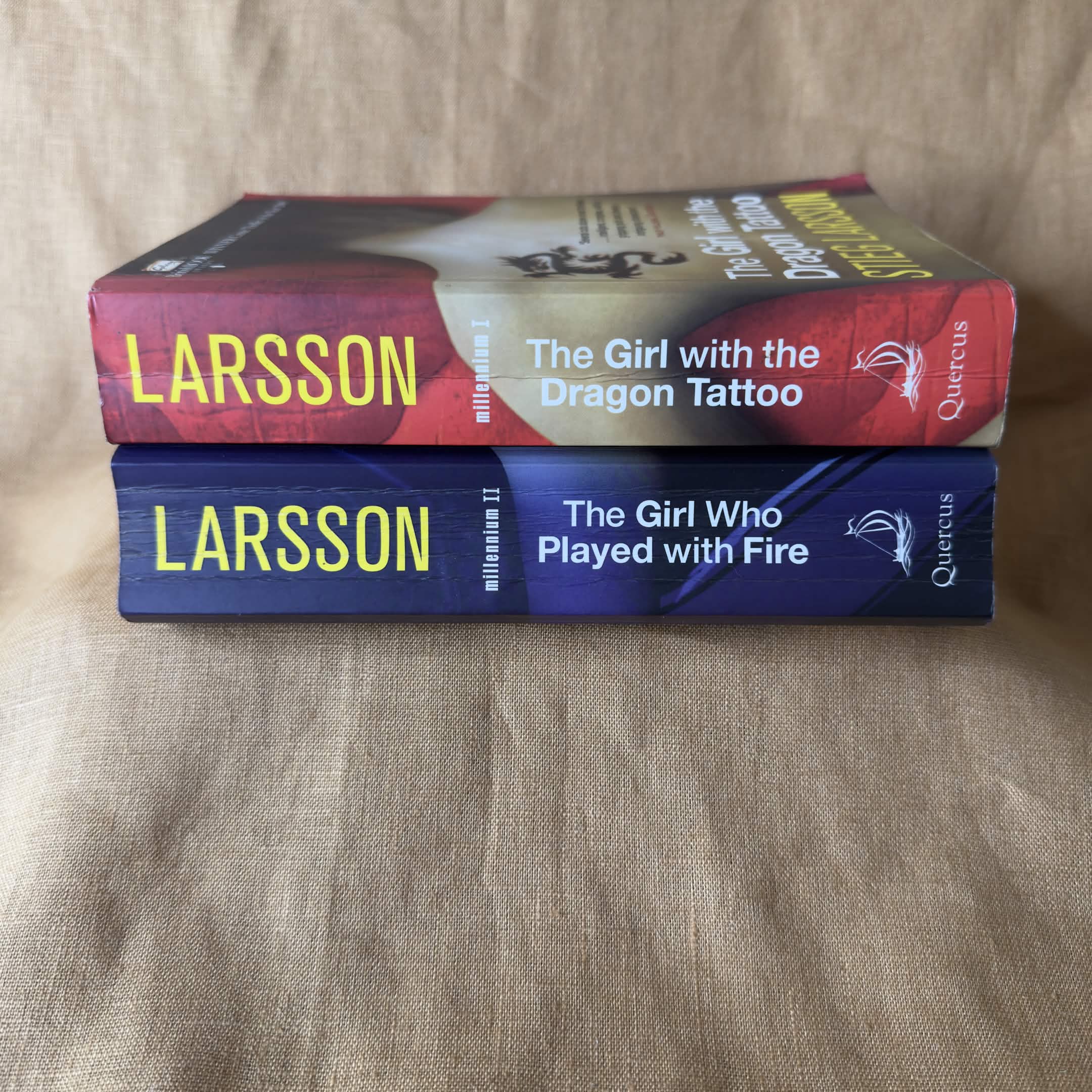 Millennium lot by Stieg Larsson: The Girl with the Dragon Tattoo and The Girl Who Played with Fire.