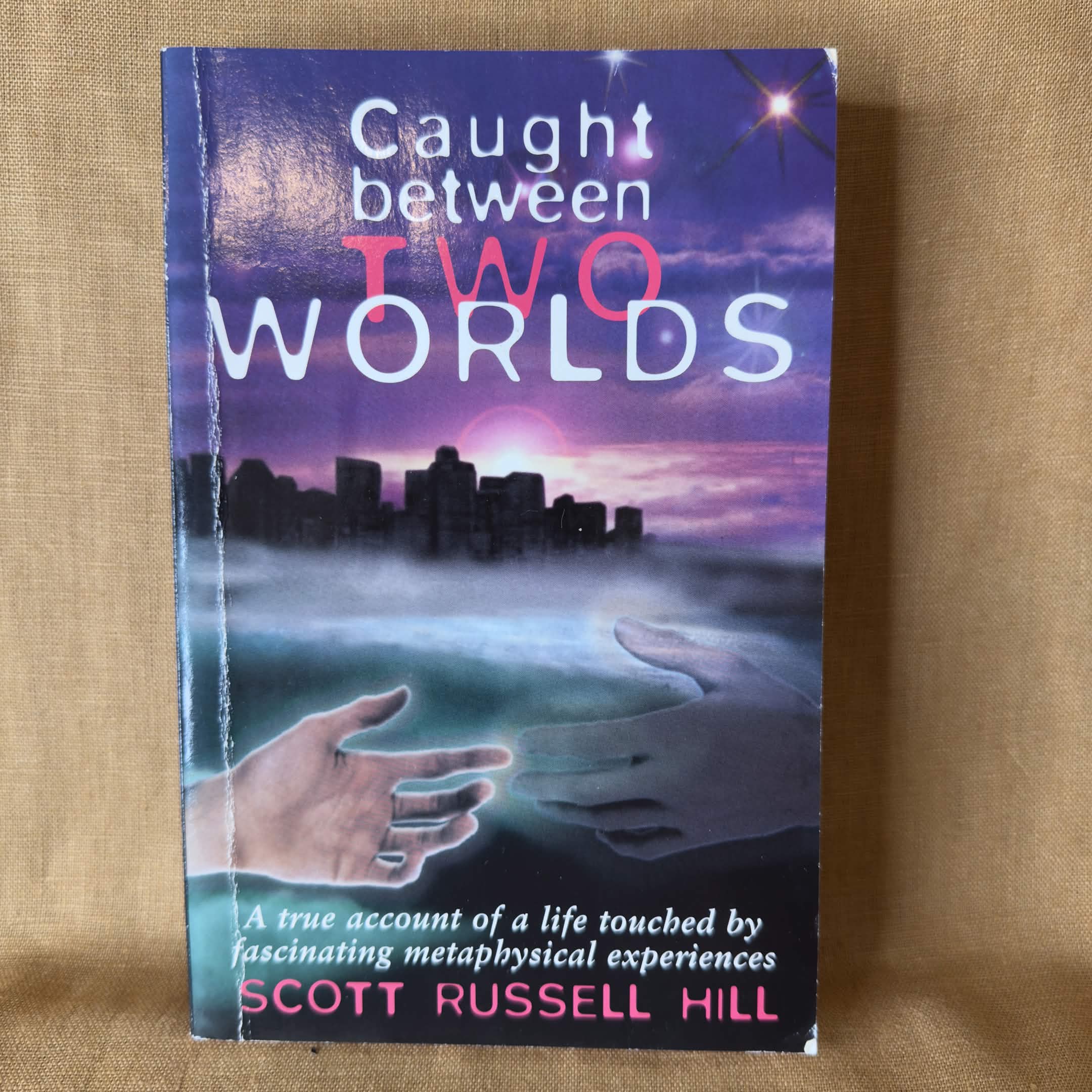 Caught Between Two Worlds — Scott Russell Hill