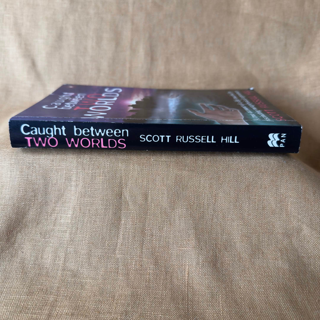 Caught Between Two Worlds — Scott Russell Hill
