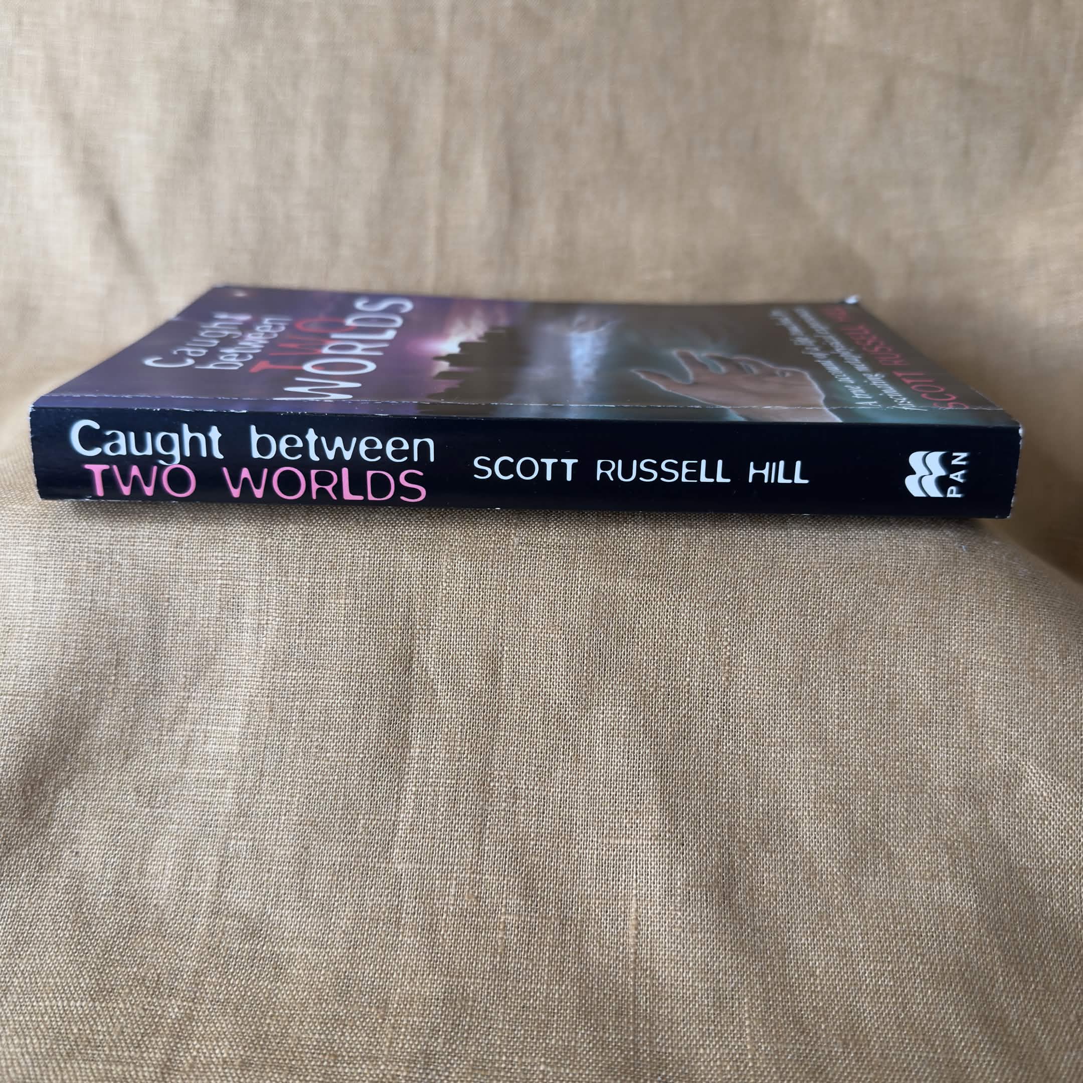 Caught Between Two Worlds — Scott Russell Hill